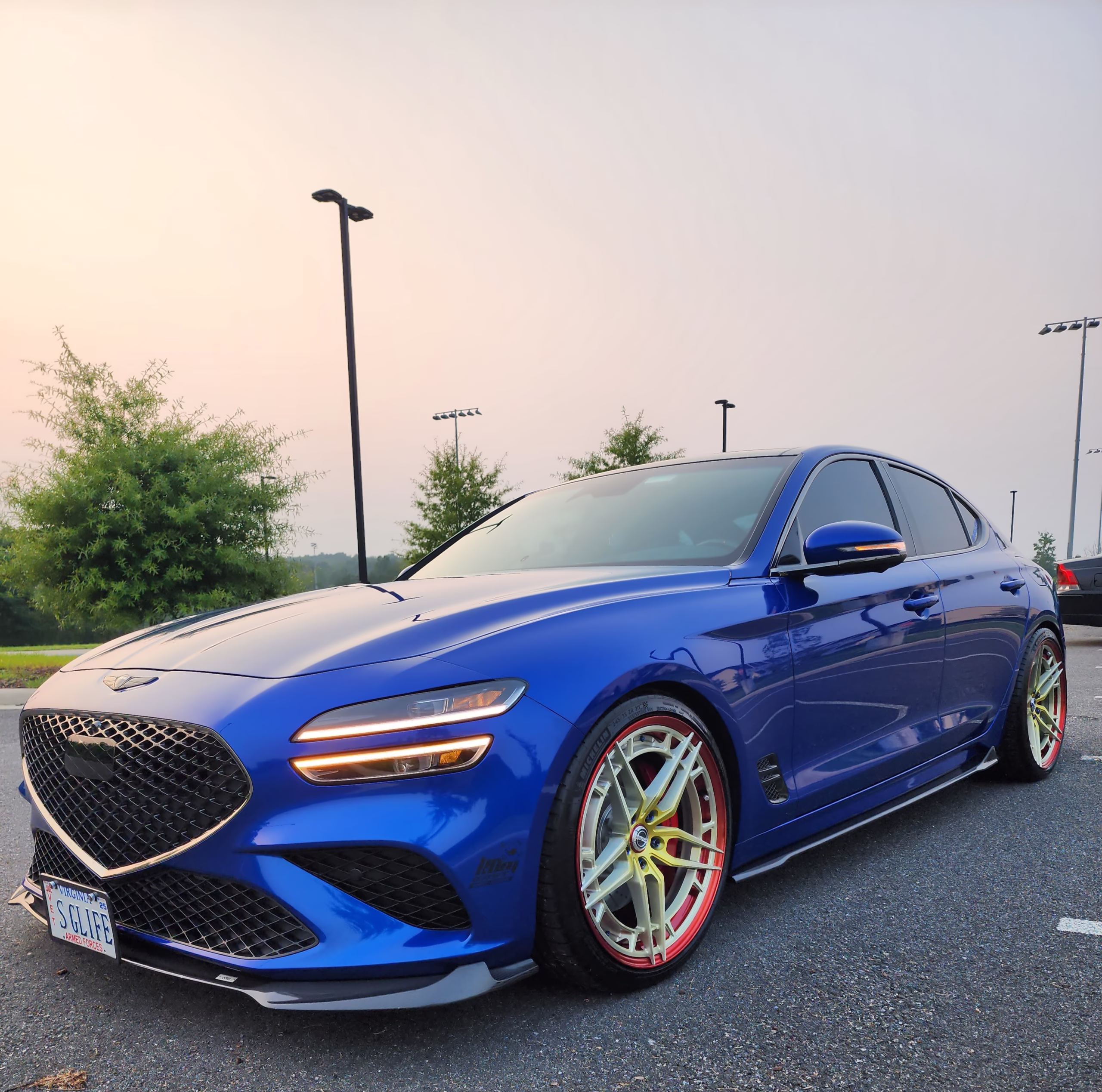 2022 Genesis G70 3.3T Mallorca Blue with PLUGNPLAYCUSTOMS amber DRLs and stainless steel quad tips